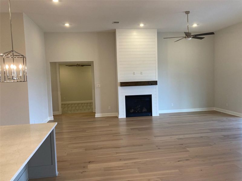 The kitchen overlooks the dining room and the family room in this marvelous plan.