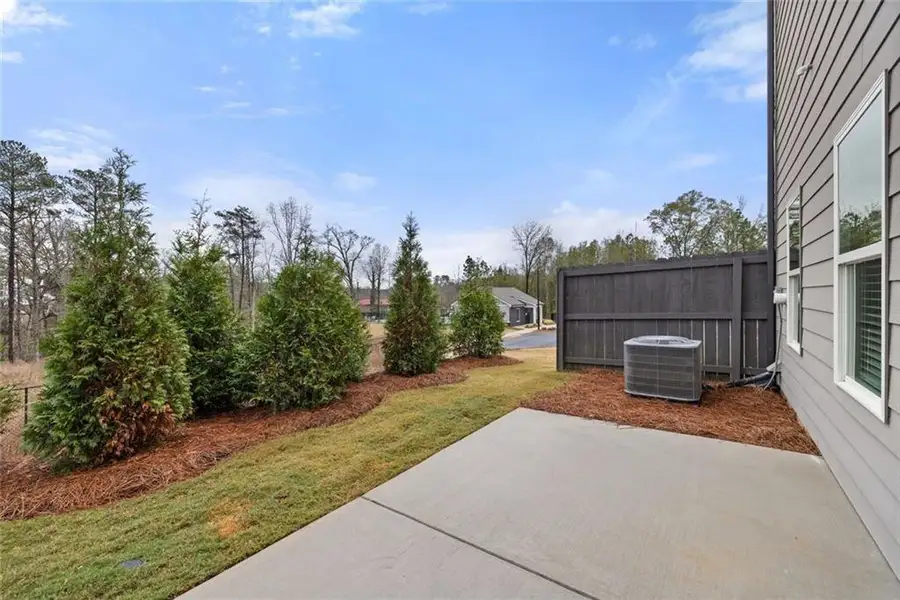 Exterior details and patio area of a home in Reeves Park, Stockbridge (Image 28).