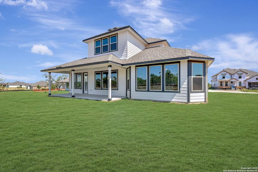 Front exterior of a new home in Preserve at Annabelle Ranch, San Antonio, TX, highlighting curb appeal (Image 14).