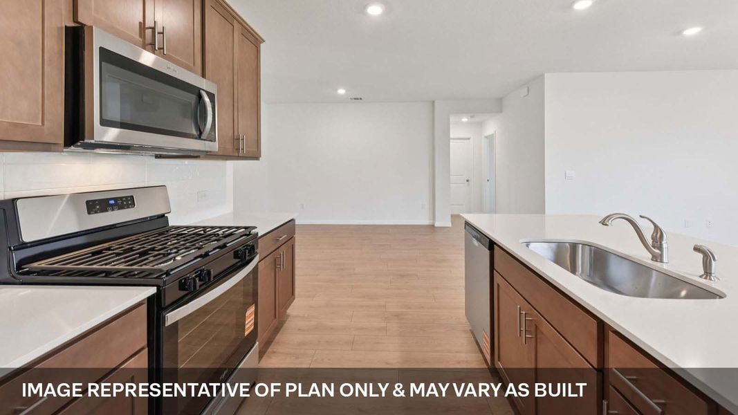 Representative furnished interior of a home built from the The Lakeway by D.R. Horton in Carillon, Manor (Image 7).