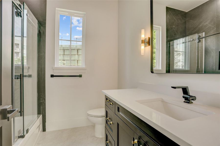 The ensuite bathroom for the third-floor guest suite. The ensuite bathroom for the third-floor guest suite.