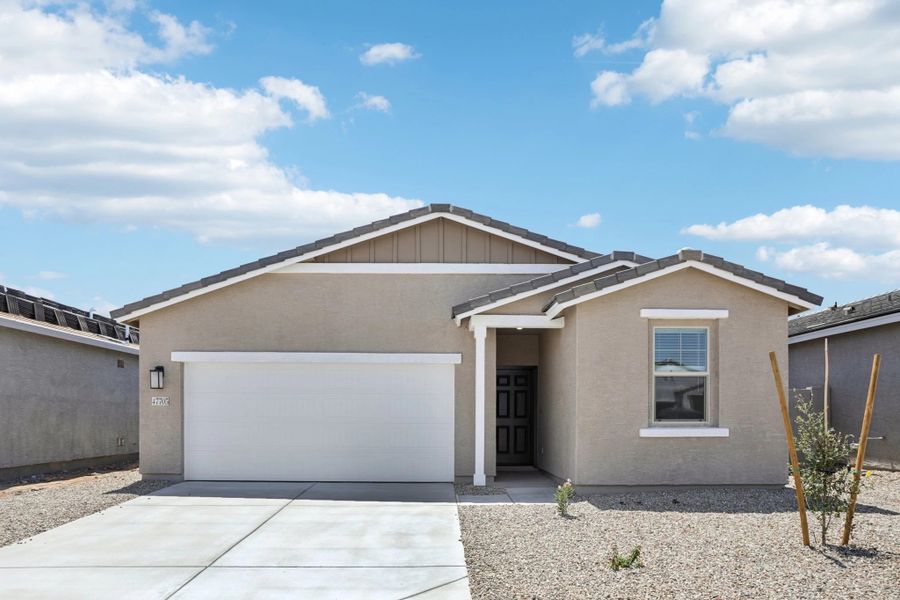 Iris Farmhouse Exterior elevation. Finishes and colors may vary by community.