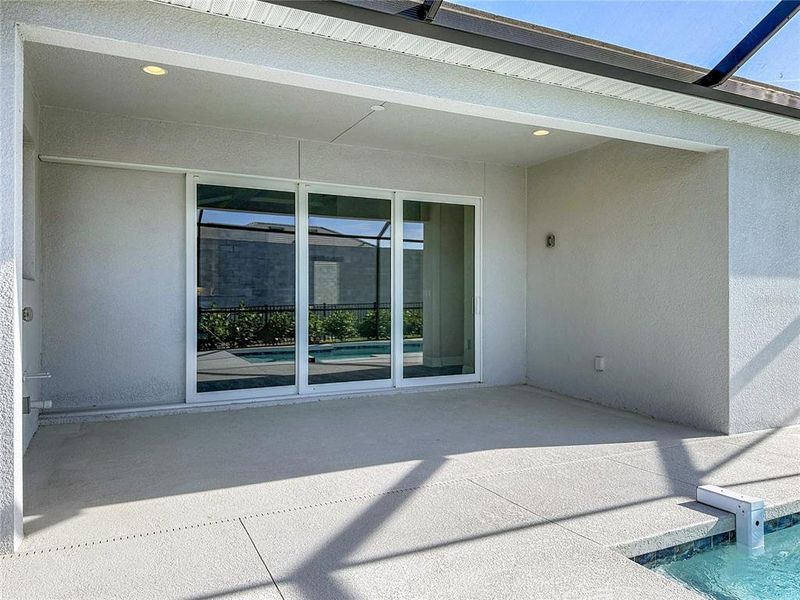 Exterior details and patio area of a home in Watercolor Place, Bradenton (Image 32).