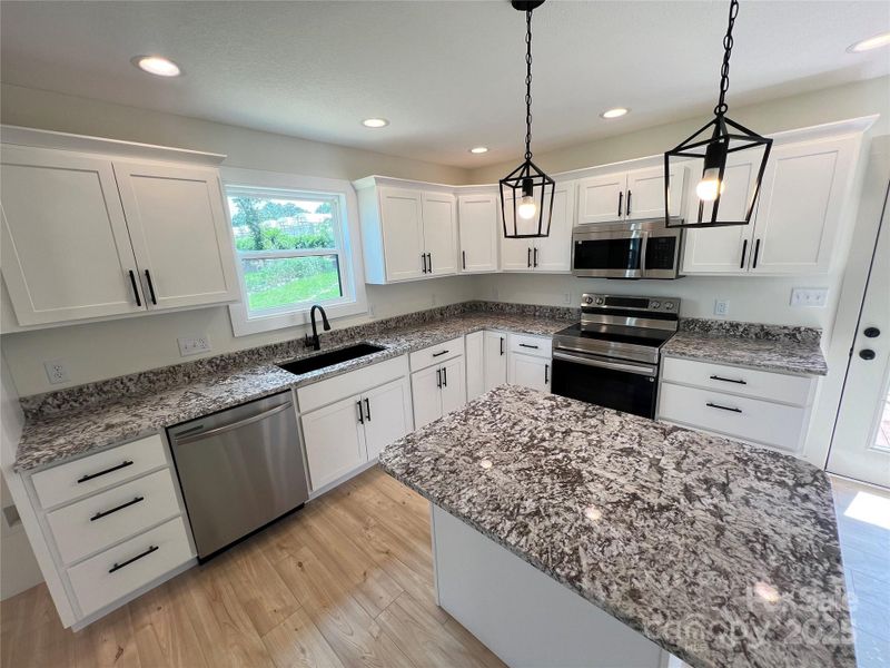 Furnished interior view inside a new home in , Asheville (Image 8).