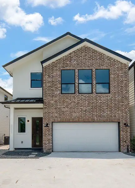 Front exterior of a new home in , Houston, TX, highlighting curb appeal (Image 1). Front exterior of a new home in , Houston, TX, highlighting curb appeal (Image 1).