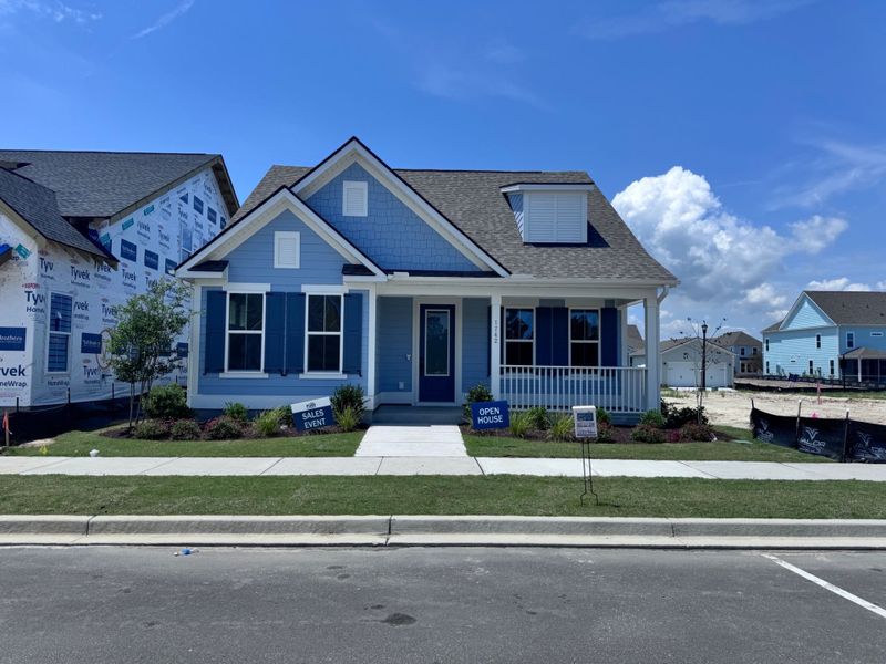 Front exterior of a new home in SayeBrook, Myrtle Beach, SC, highlighting curb appeal (Image 23). Front exterior of a new home in SayeBrook, Myrtle Beach, SC, highlighting curb appeal (Image 23).