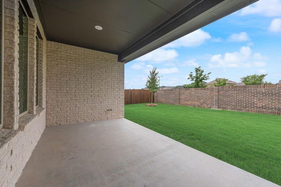 Exterior details and patio area of a home in Valencia On The Lake, Little Elm (Image 3).