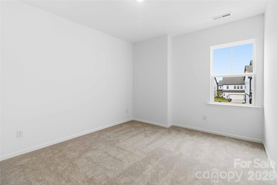 Spacious, unfurnished interior of a new home in Ridge at Sugar Creek, Indian Land (Image 31).