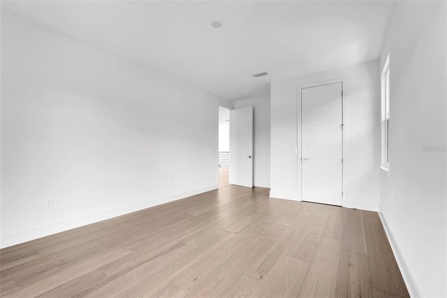 Spacious, unfurnished interior of a new home in Hampton Green at Providence, Davenport (Image 49).