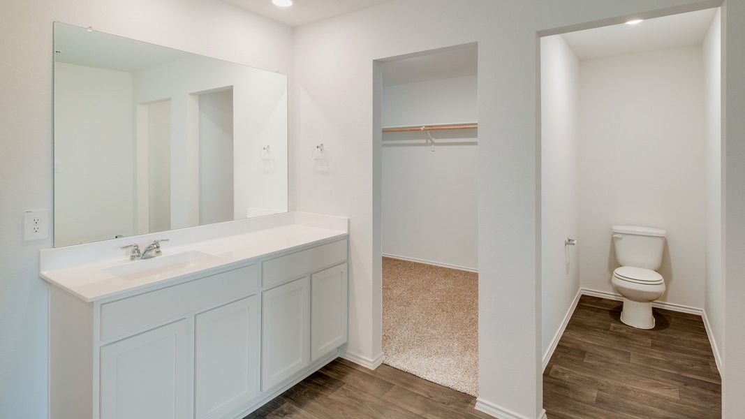 Representative furnished interior of a home built from the The Gaven by D.R. Horton in Wayside, Uhland (Image 6).