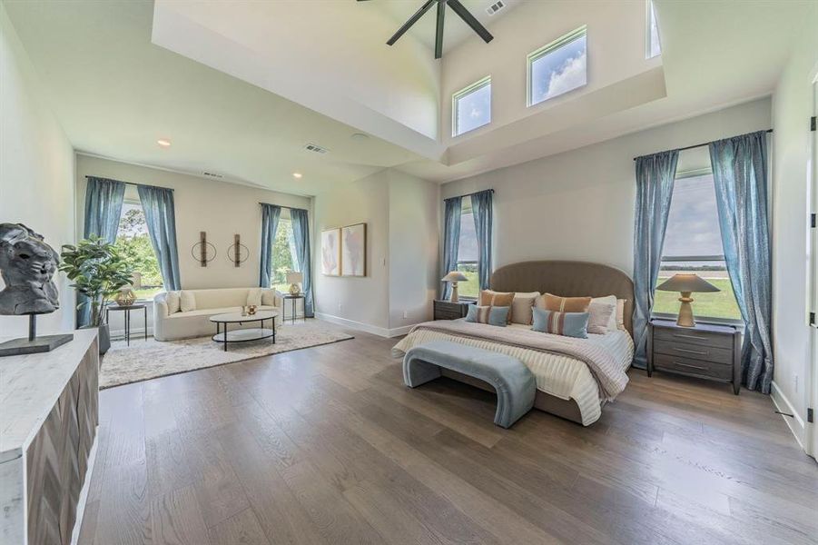 Bedroom with dark wood-style floors and recessed lighting Bedroom with dark wood-style floors and recessed lighting