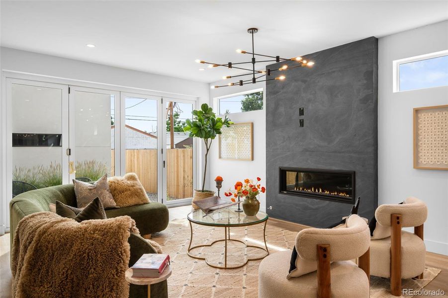 Open floorplan living room with fireplace