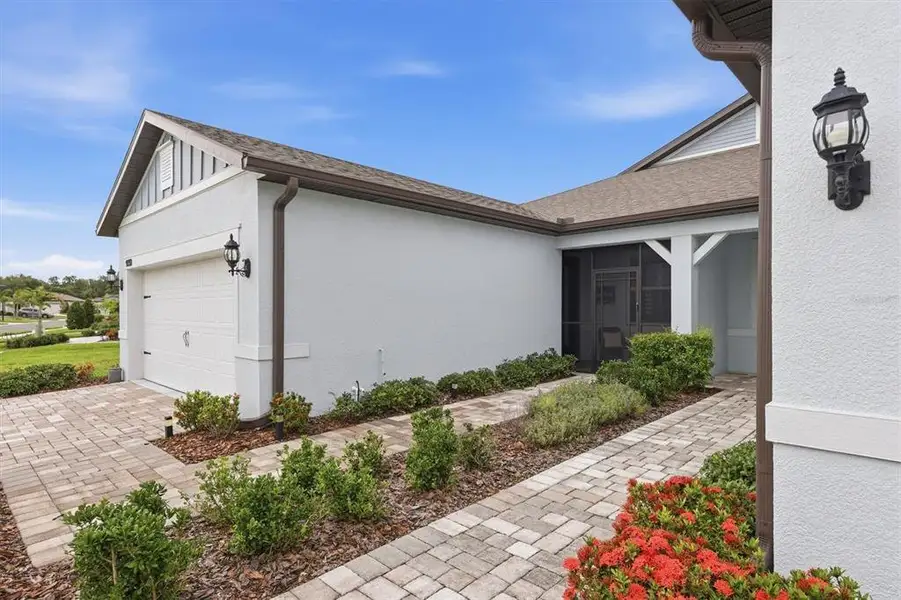 Exterior details and patio area of a home in , Parrish (Image 3).