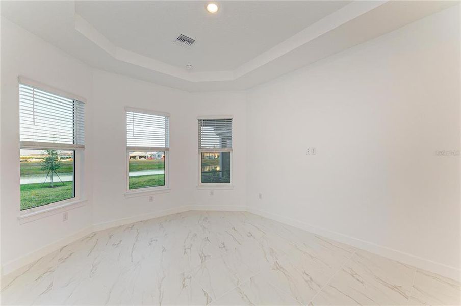 Spacious, unfurnished interior of a new home in Esplanade at Azario Lakewood Ranch, Lakewood Ranch (Image 34). Spacious, unfurnished interior of a new home in Esplanade at Azario Lakewood Ranch, Lakewood Ranch (Image 34).