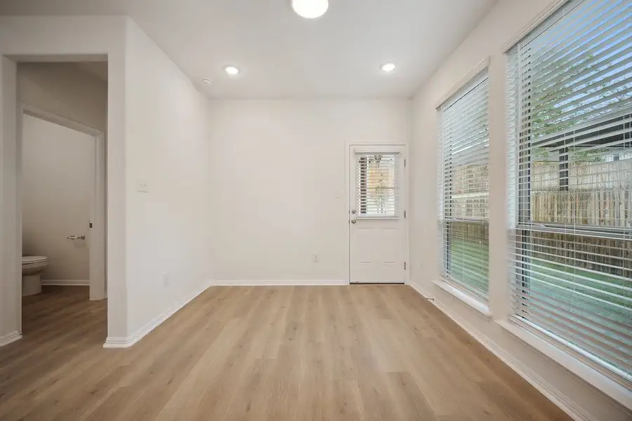 Spacious, unfurnished interior of a new home in The Hills of Bear Creek, Manchaca (Image 9).