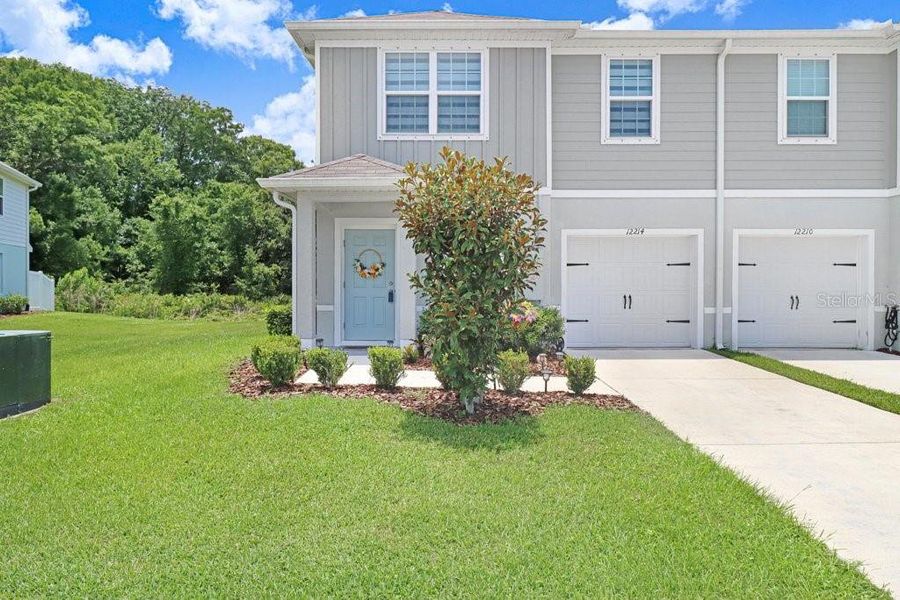 Front exterior of a new home in , New Port Richey, FL, highlighting curb appeal (Image 21).