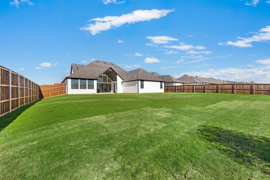 Exterior details and patio area of a home in NorthGlen, Haslet (Image 27).