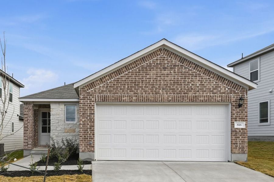 Representative exterior photo of a completed home built from the Eagle by Taylor Morrison in Longview, Del Valle, TX (Image 15). Representative exterior photo of a completed home built from the Eagle by Taylor Morrison in Longview, Del Valle, TX (Image 15).