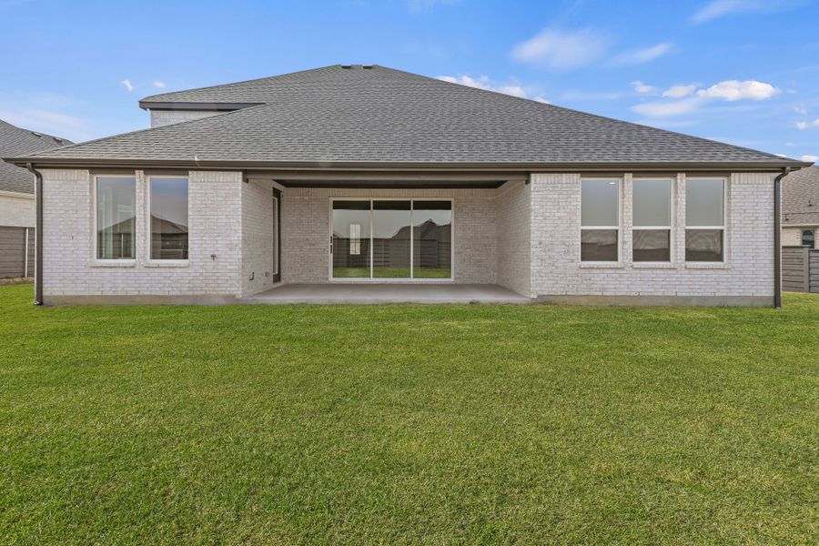 Exterior details and patio area of a home in Union Park, Little Elm (Image 3).