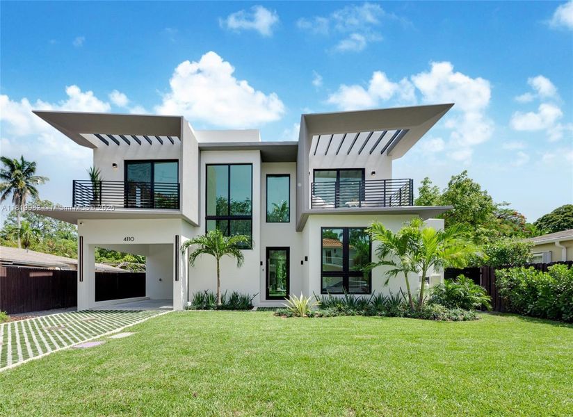 Front exterior of a new home in , Miami, FL, highlighting curb appeal (Image 19). Front exterior of a new home in , Miami, FL, highlighting curb appeal (Image 19).
