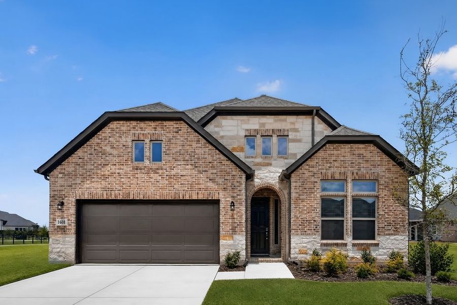Front exterior of a new home in The Ridge at Northlake, Northlake, TX, highlighting curb appeal (Image 1). Front exterior of a new home in The Ridge at Northlake, Northlake, TX, highlighting curb appeal (Image 1).