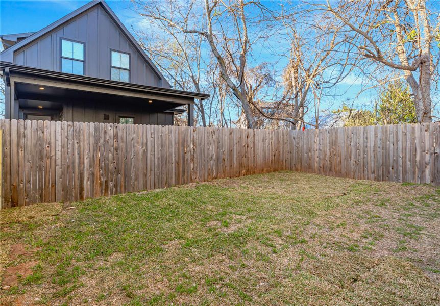 View of yard featuring a fenced backyard