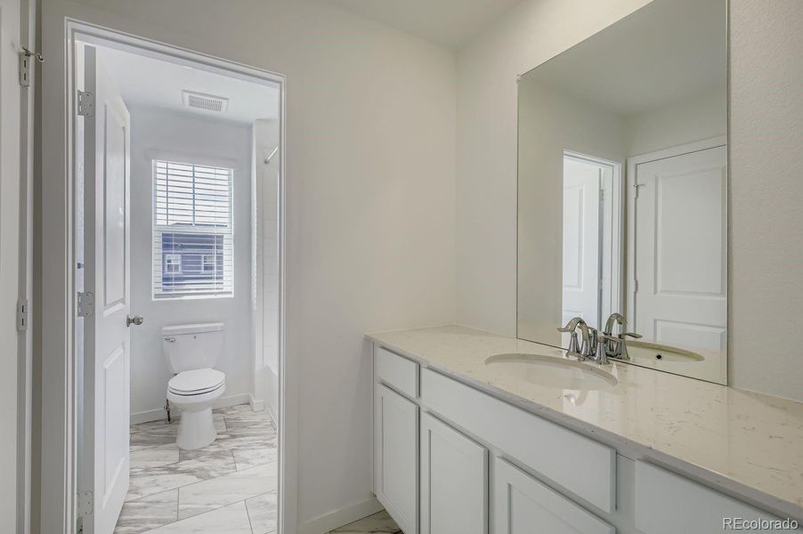 Furnished interior view inside a new home in Ledge Rock: The Monarch Collection, Johnstown (Image 6).