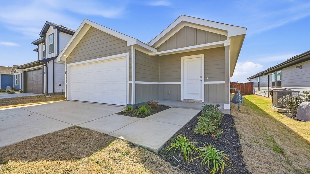 Representative exterior photo of a completed home built from the Caprock by D.R. Horton in Hickory Grove, Krum, TX (Image 2).