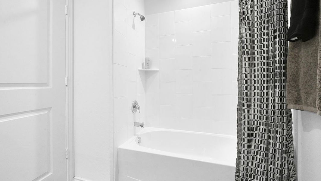 Furnished interior view inside a new home in Tamarron, Fulshear (Image 9).