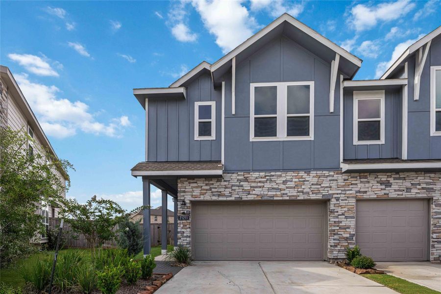 Front exterior of a new home in , Cypress, TX, highlighting curb appeal (Image 2). Front exterior of a new home in , Cypress, TX, highlighting curb appeal (Image 2).