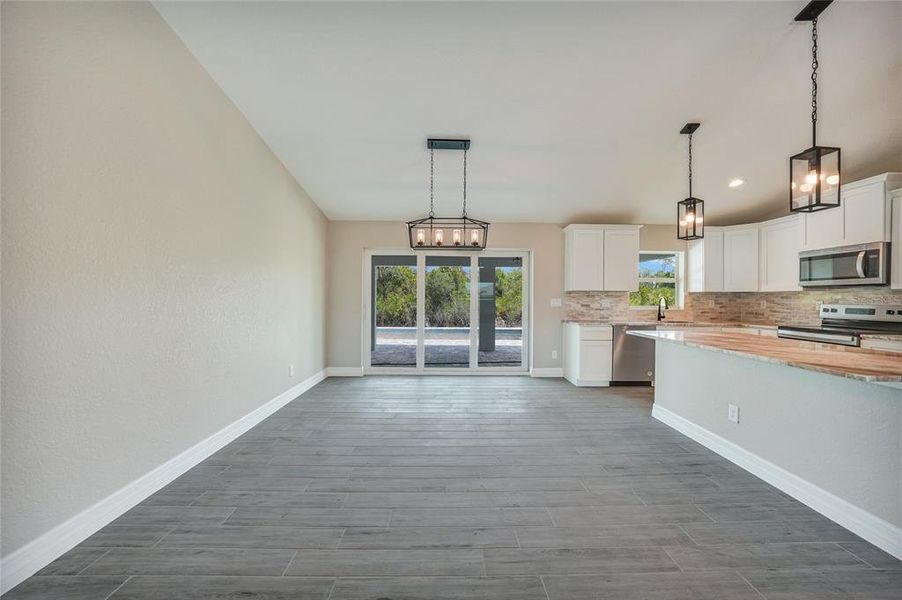 Furnished interior view inside a new home in , Port Charlotte (Image 9). Furnished interior view inside a new home in , Port Charlotte (Image 9).