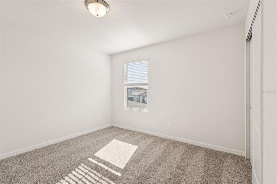 Spacious, unfurnished interior of a new home in The Reserve at Hammock Oaks - Classic Series, Lady Lake (Image 16).