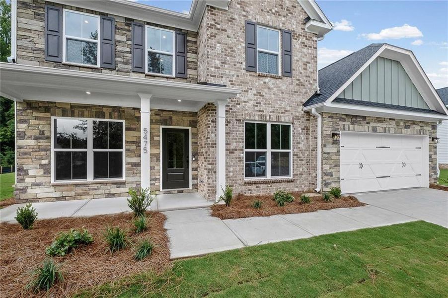Exterior details and patio area of a home in Oakwood, Cumming (Image 19). Exterior details and patio area of a home in Oakwood, Cumming (Image 19).