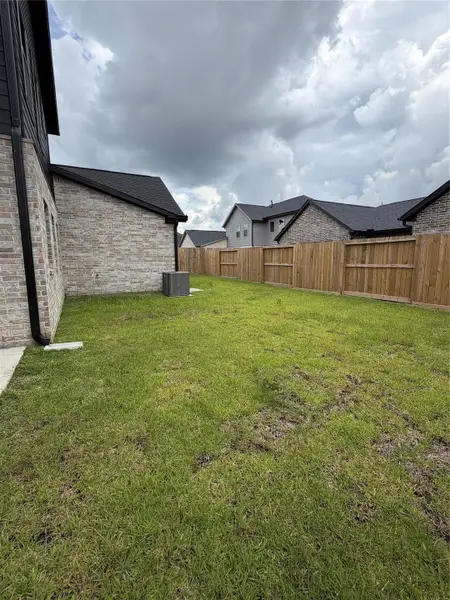 Exterior details and patio area of a home in , Spring (Image 4).