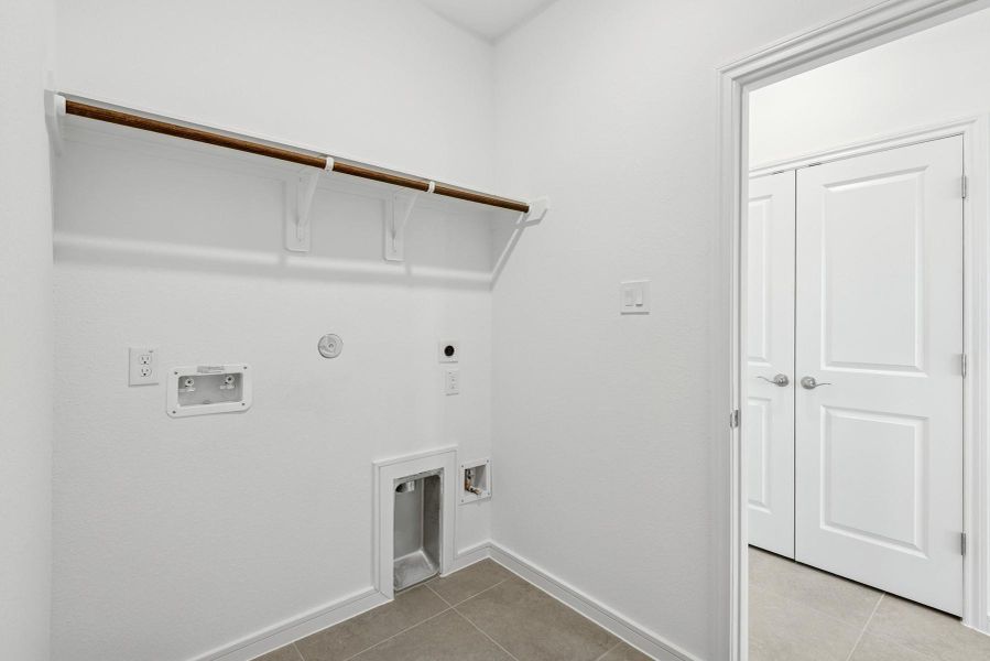 Laundry room (*Photo not of actual home and used for illustration purposes only.)