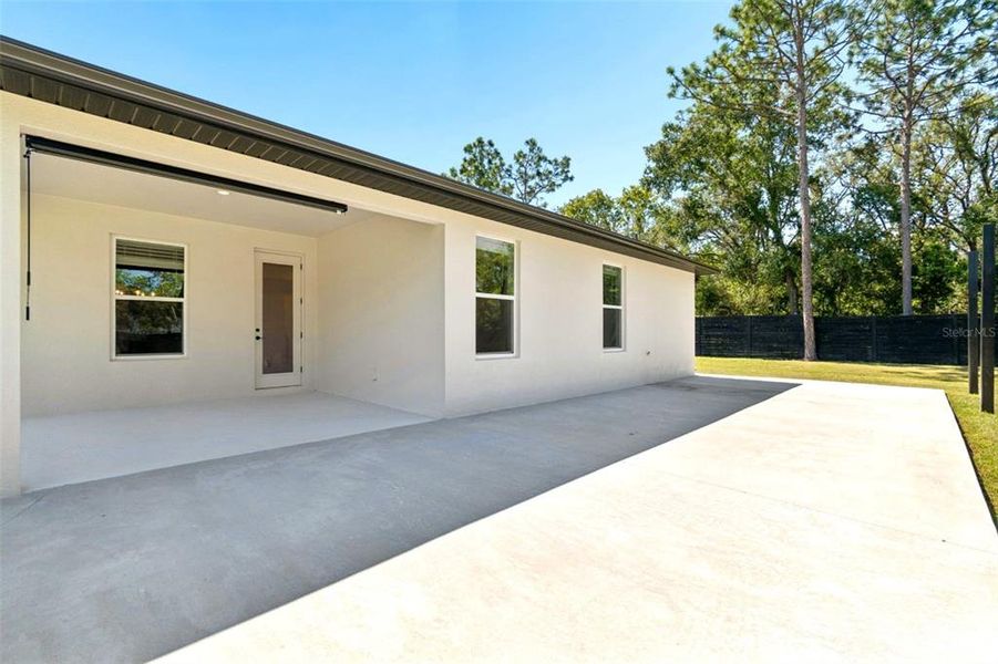 Exterior details and patio area of a home in , Spring Hill (Image 39).