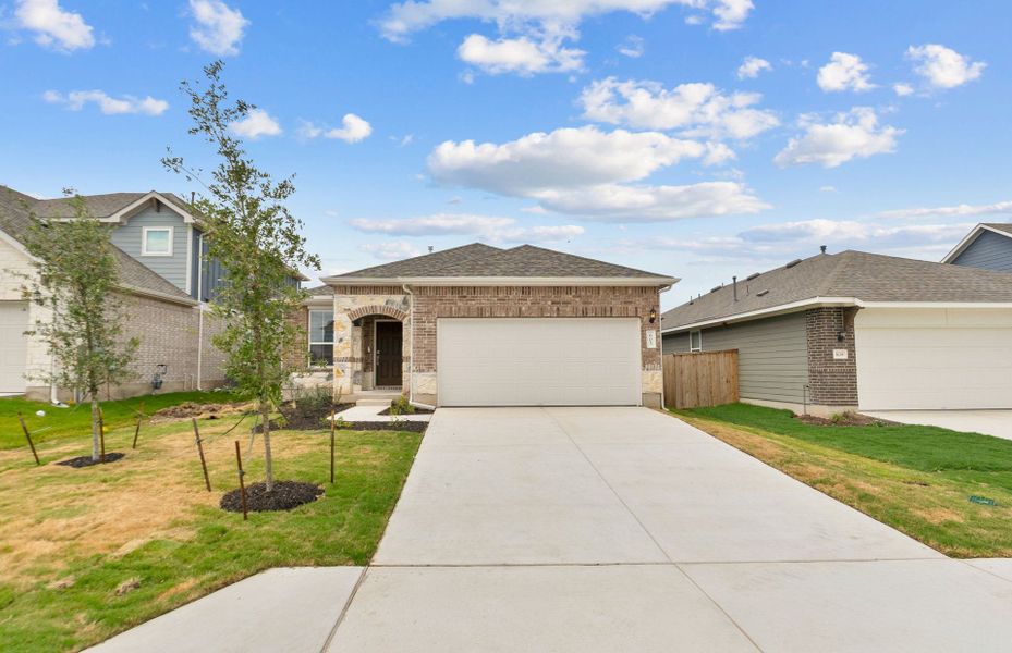 Front exterior of a new home in Patterson Ranch, Georgetown, TX, highlighting curb appeal (Image 17).