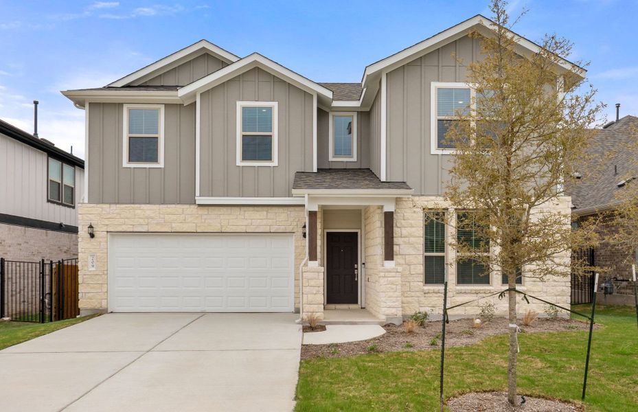 Front exterior of a new home in Saddleback at Santa Rita Ranch, Liberty Hill, TX, highlighting curb appeal (Image 24).