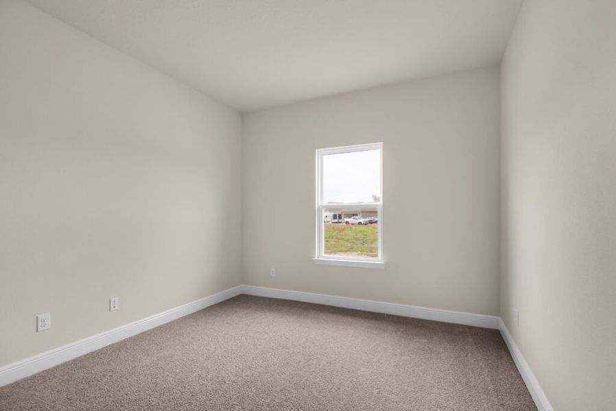 Representative unfurnished interior of a home built from the Walton by Holiday Builders in Yellow River Ranch, Milton (Image 13).
