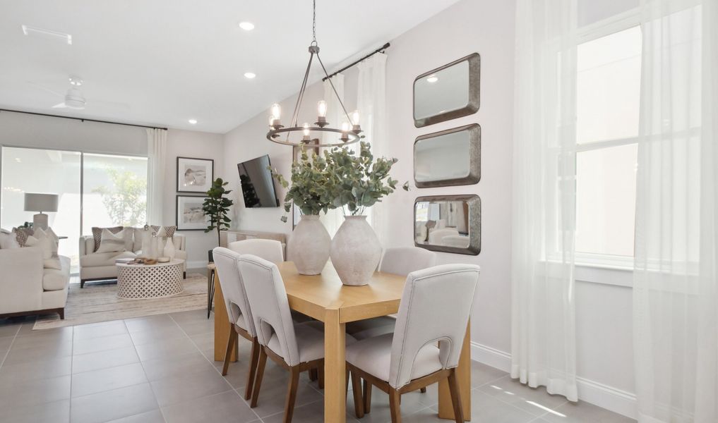 Dining area with tile flooring