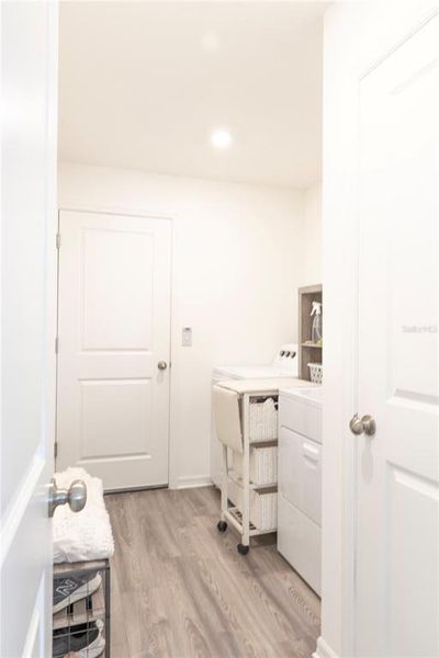 Furnished interior view inside a new home in Eagle Hammock, Eagle Lake (Image 9).