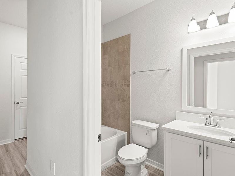 Along with the convenience of a full bath on the first floor - Danyella bungalow by Highland Homes