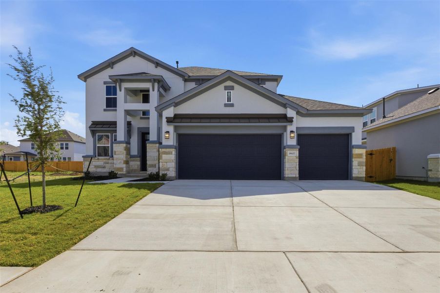 Front exterior of a new home in , Pflugerville, TX, highlighting curb appeal (Image 1). Front exterior of a new home in , Pflugerville, TX, highlighting curb appeal (Image 1).