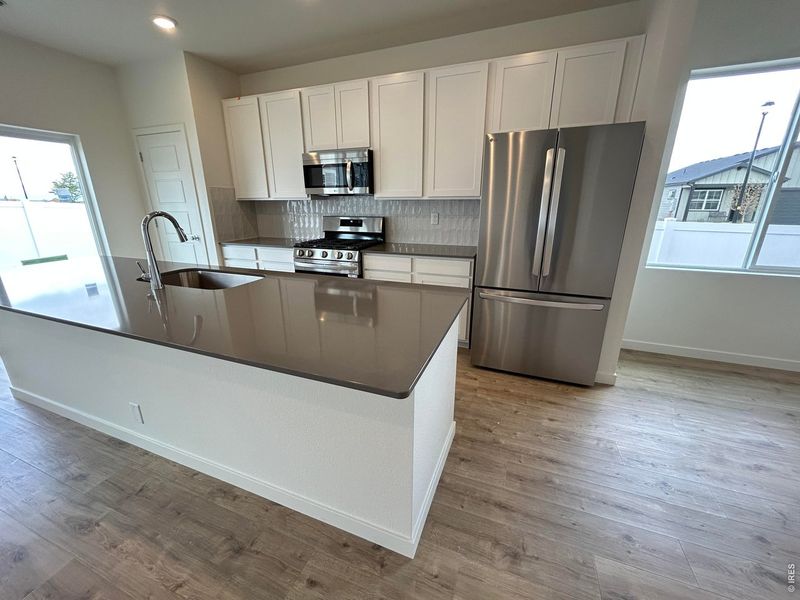 Furnished interior view inside a new home in Union Colony West, Greeley (Image 8).