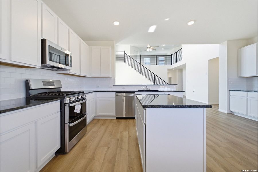 Furnished interior view inside a new home in Hickory Ridge, Elmendorf (Image 6).