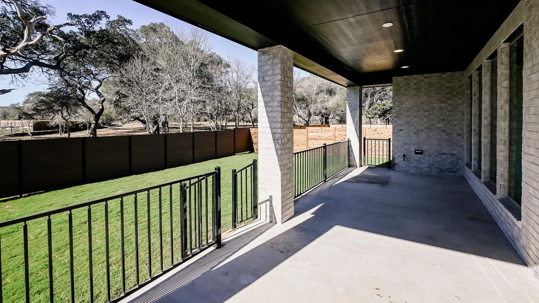 Exterior details and patio area of a home in Juniper Springs, Lockhart (Image 28).