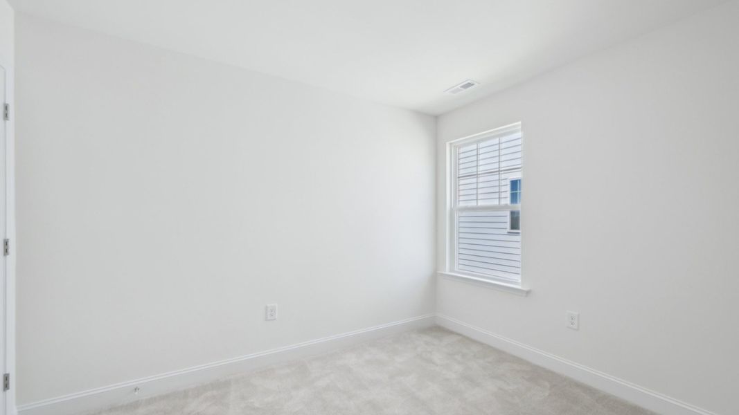 Representative furnished interior of a home built from the Bordeaux by DRB Homes in Sidney Creek Single Family, Zebulon (Image 28).