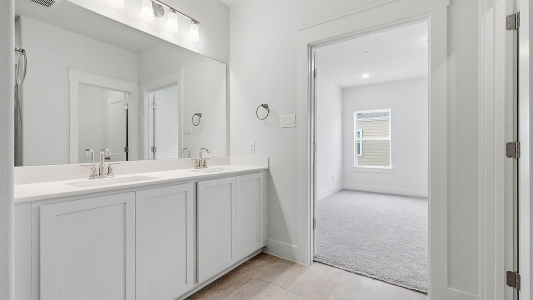 Furnished interior view inside a new home in Collin Creek, Plano (Image 43).