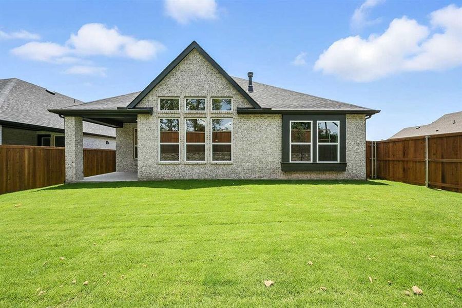 Front exterior of a new home in Heritage Ranch: 50ft. lots, Sherman, TX, highlighting curb appeal (Image 1). Front exterior of a new home in Heritage Ranch: 50ft. lots, Sherman, TX, highlighting curb appeal (Image 1).
