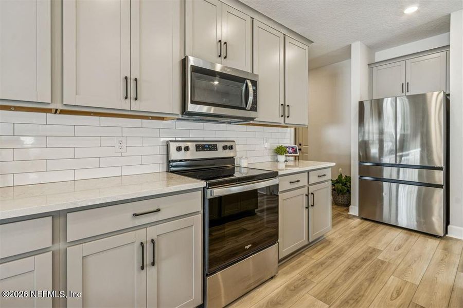 Furnished interior view inside a new home in , Fernandina Beach (Image 17).